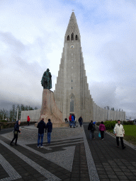 Miaomiao`s parents in front of the statue of Leif Ericson at the Eriksgata street and the front of the Hallgrímskirkja church