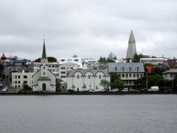 The east side of the Tjörnin lake, the Fríkirkjan church and the Hallgrímskirkja church, viewed from the Tjarnargata street