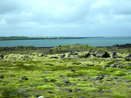 The town of Flekkurvík, viewed from the rental car on the Reykjanesbraut road