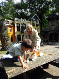 Max, Kees and a cat at the Karpatica village at the Ouwehands Dierenpark zoo