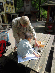 Max, Kees and a cat at the Karpatica village at the Ouwehands Dierenpark zoo