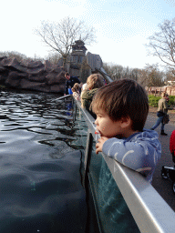 Max and a zookeeper feeding the Humboldt Penguins at the Ouwehands Dierenpark zoo