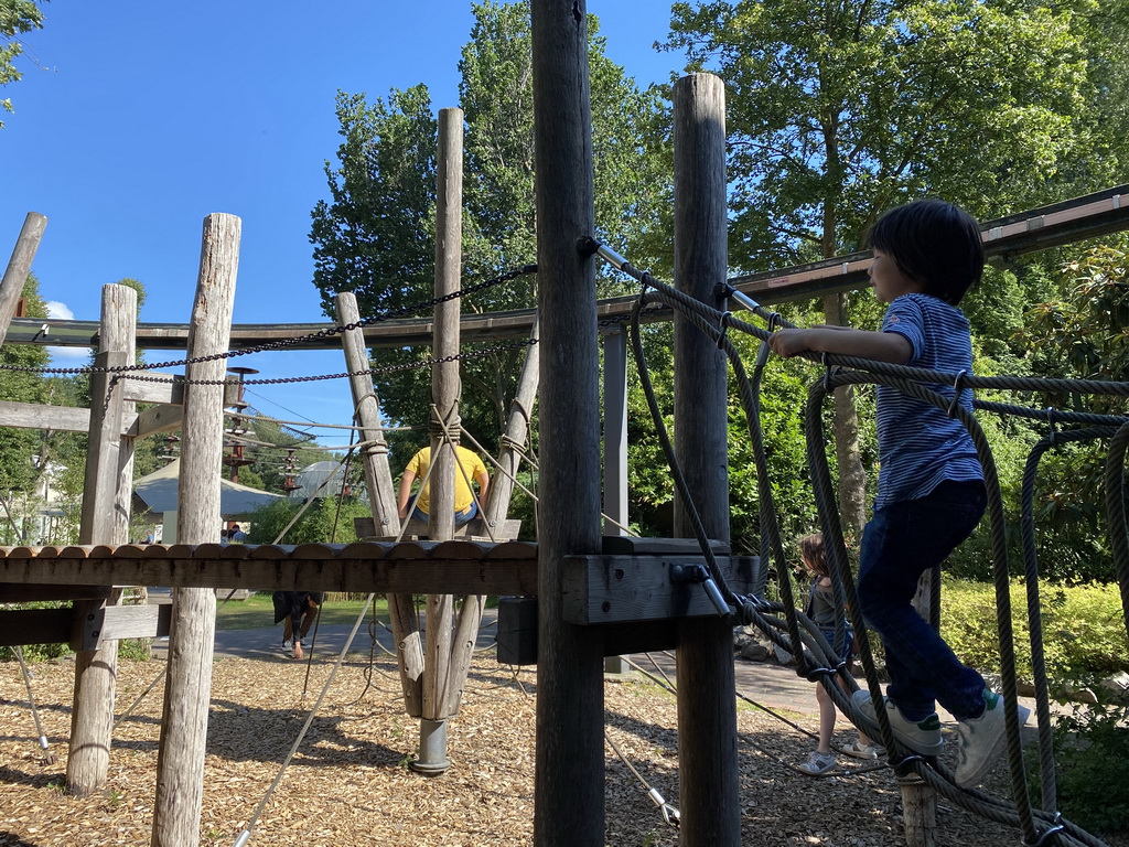 Max on a rope bridge at the playground just outside the RavotAapia building at the Ouwehands Dierenpark zoo