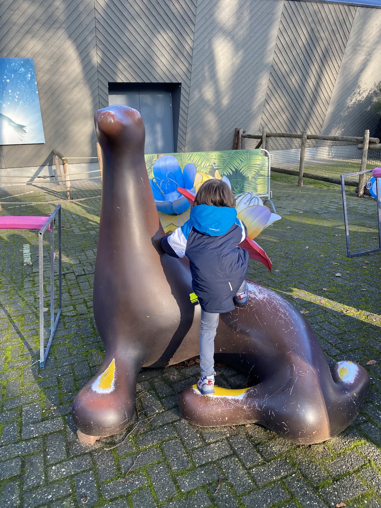 Max on a Sea Lion statue at the Ouwehands Dierenpark zoo