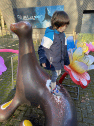 Max on a Sea Lion statue at the Ouwehands Dierenpark zoo