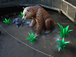 China Light statues of a Brown Bear and Wolves at the Berenbos Expedition at the Ouwehands Dierenpark zoo