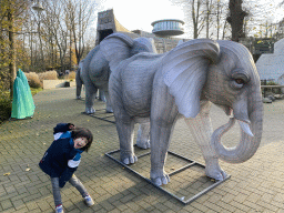 Max with China Light statues of Elephants at the Ouwehands Dierenpark zoo