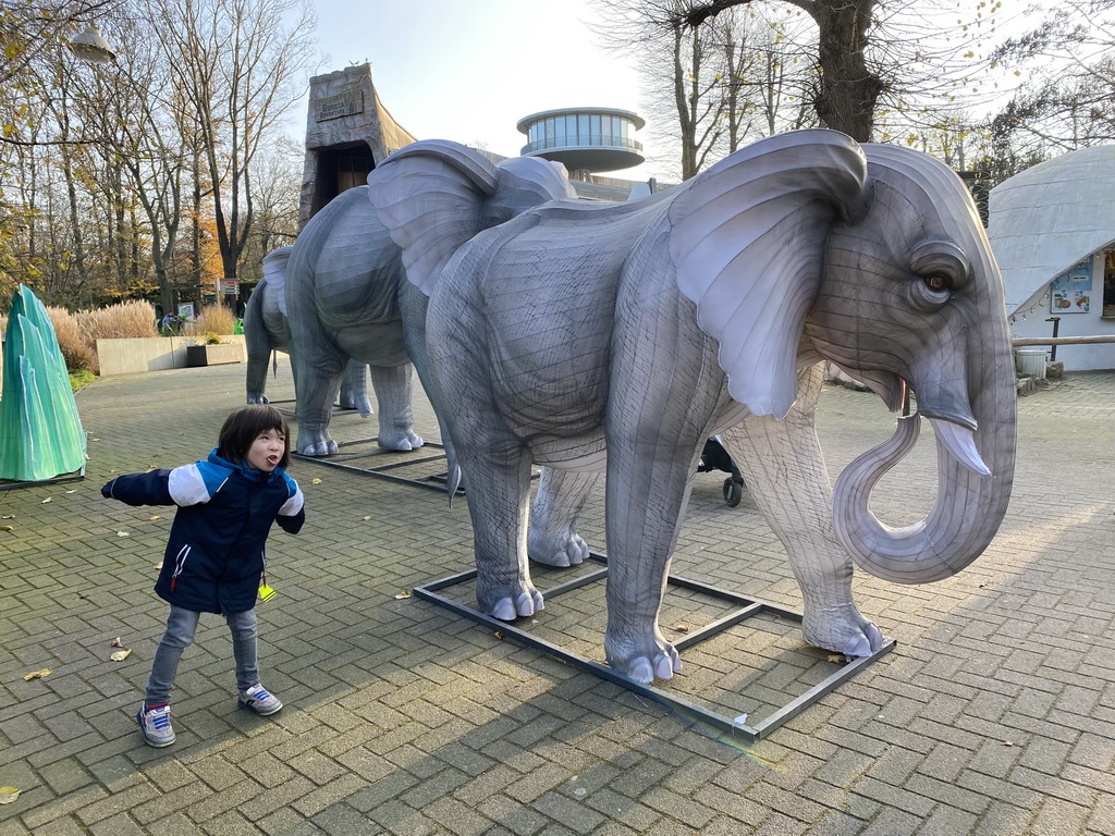 Max with China Light statues of Elephants at the Ouwehands Dierenpark zoo