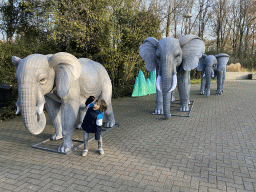 Max with China Light statues of Elephants at the Ouwehands Dierenpark zoo