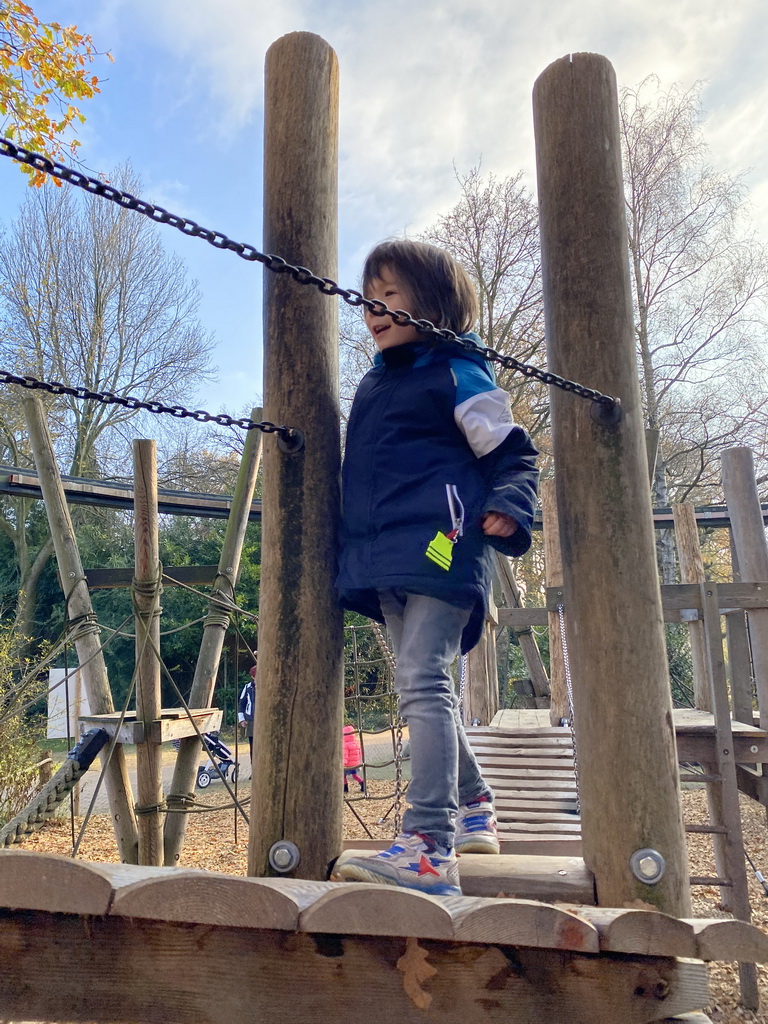 Max on a rope bridge at the playground just outside the RavotAapia building at the Ouwehands Dierenpark zoo