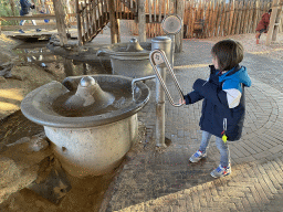 Max playing with water at the RavotAapia building at the Ouwehands Dierenpark zoo