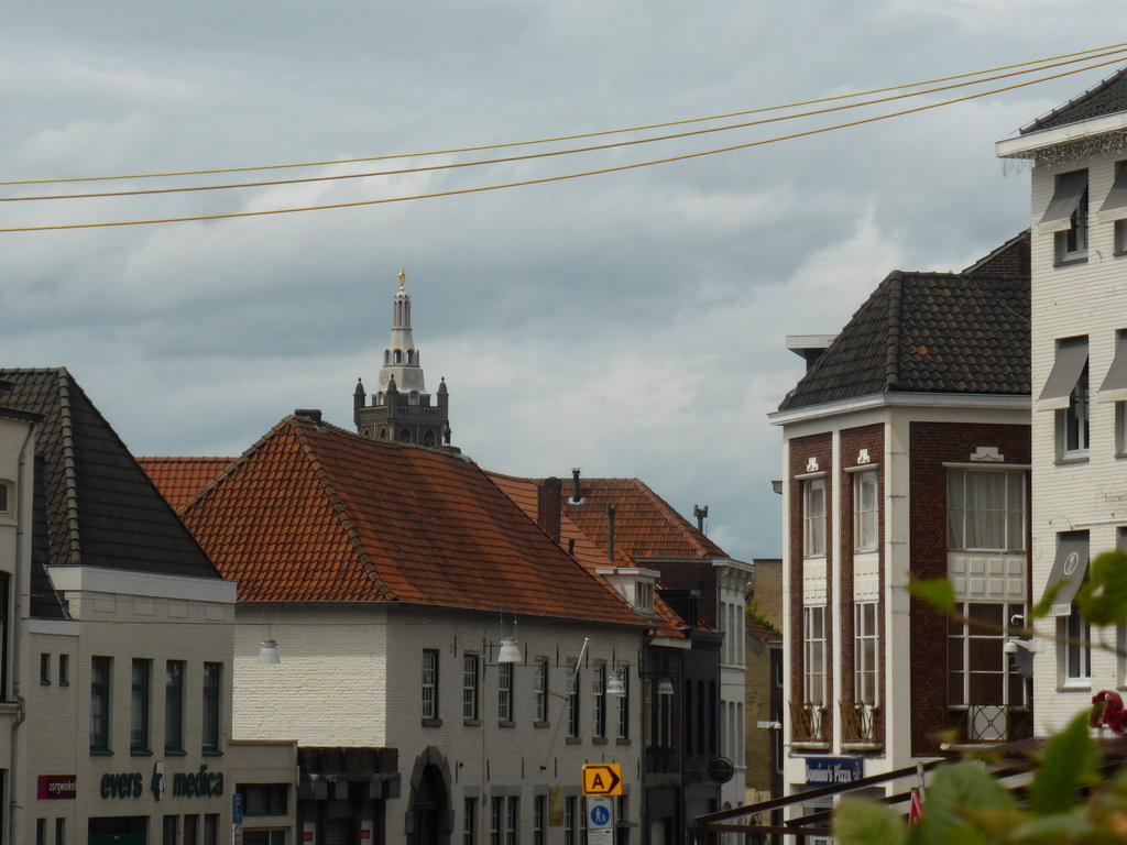 Tower of the Saint Christopher Cathedral and the Veldstraat street, viewed from the Stationsplein square