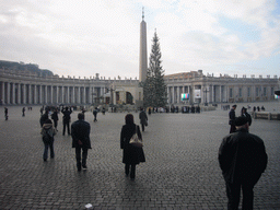Miaomiao at Saint Peter`s Square, with a christmas tree and the Nativity of Jesus