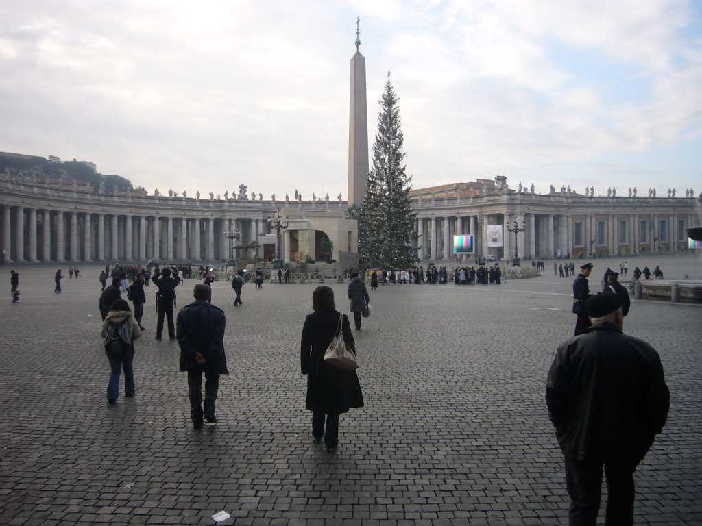 Miaomiao at Saint Peter`s Square, with a christmas tree and the Nativity of Jesus