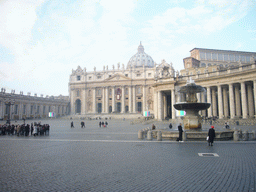 Saint Peter`s Square with St. Peter`s Basilican and the North fountain