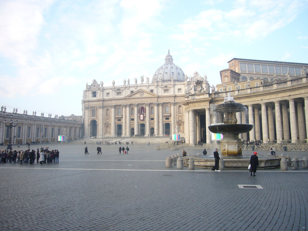 Saint Peter`s Square with St. Peter`s Basilican and the North fountain