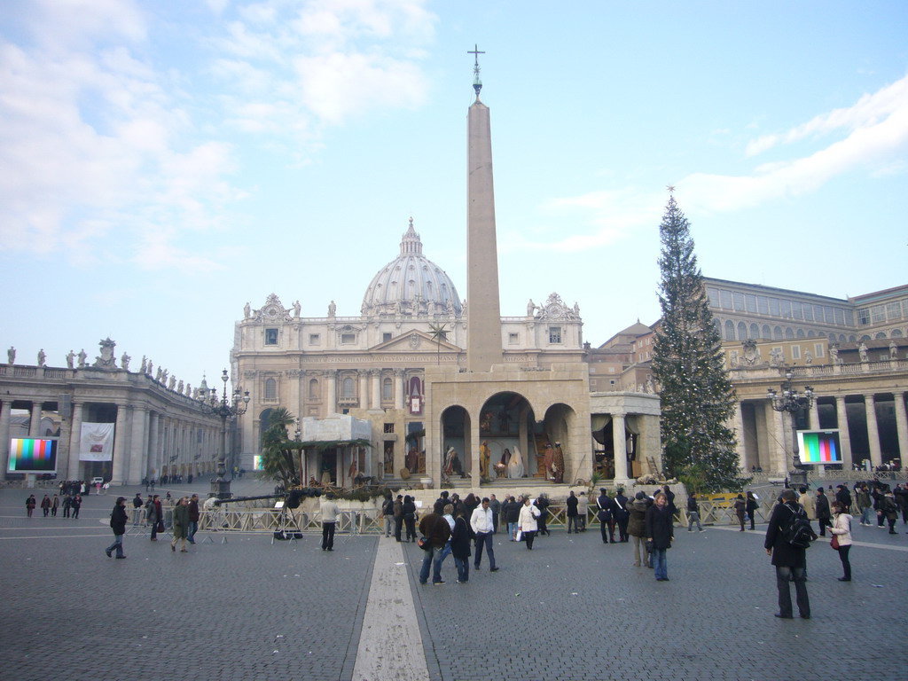 Saint Peter`s Square, with the Vatican Obelisk, a christmas tree and the Nativity of Jesus