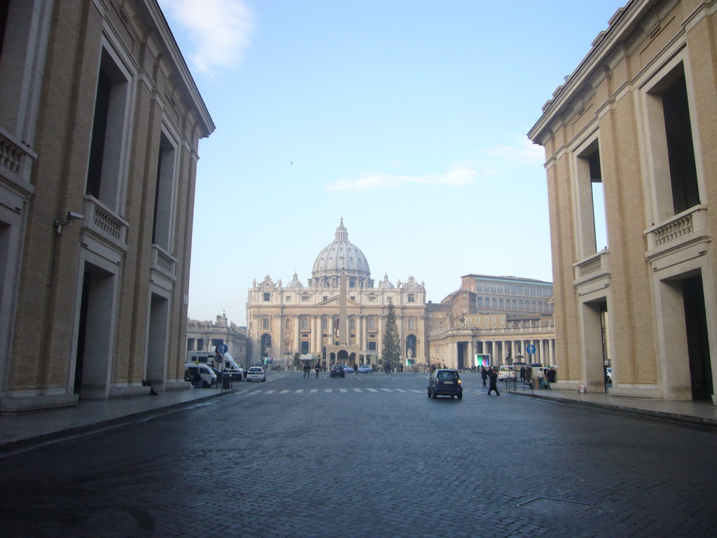 Saint Peter`s Square, with the Vatican Obelisk, a christmas tree and the Nativity of Jesus, from the Via della Conciliazione street