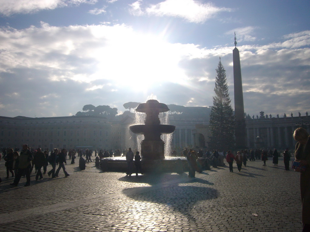 Saint Peter`s Square, with the North fountain, the Vatican Obelisk and a christmas tree