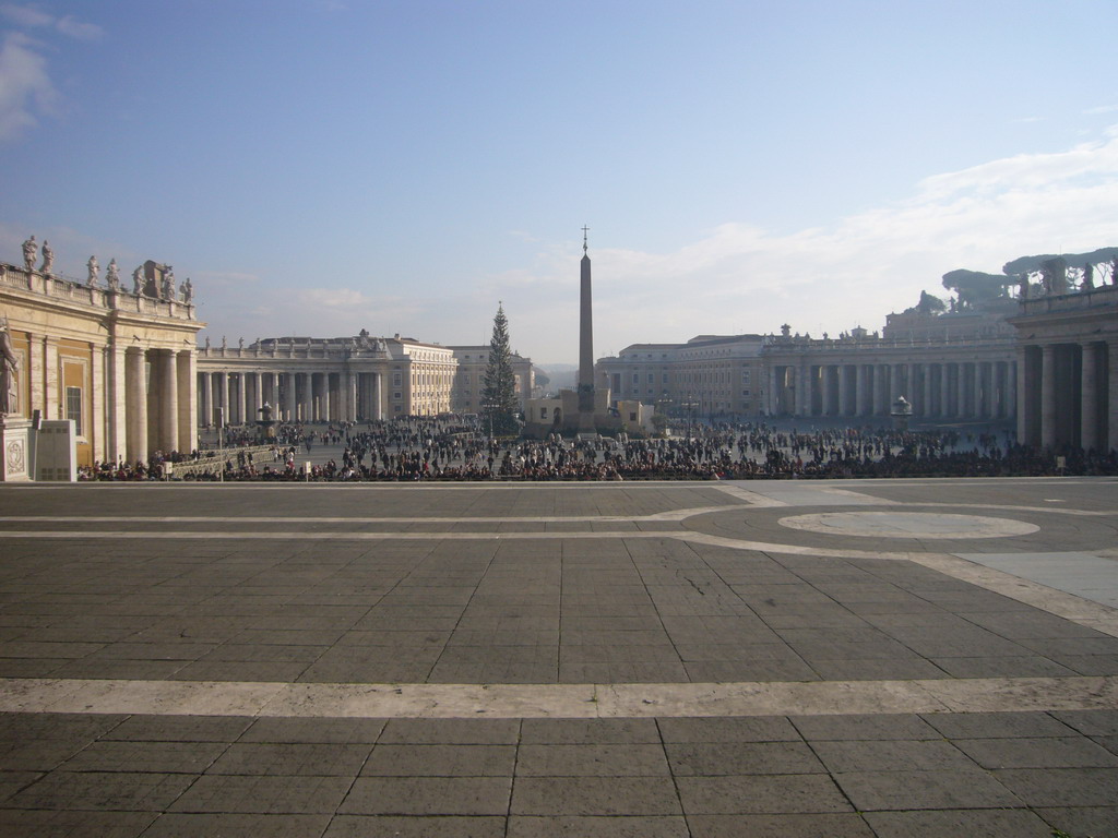 Saint Peter`s Square, with the Vatican Obelisk, a christmas tree and the Nativity of Jesus, from in front of St. Peter`s Basilica