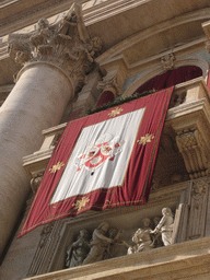 The Pope`s Window at the facade of St. Peter`s Basilica, from right below