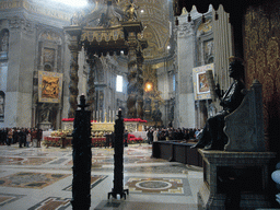 The Statue of St. Peter, the crossing with the Papal Altar and Baldacchino, and the Tribune (Altar of the Chair of St. Peter), inside St. Peter`s Basilica
