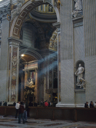 The nave of St. Peter`s Basilica, with the statue of St. Camillo de Lellis and the Monument of Pope Benedict XV