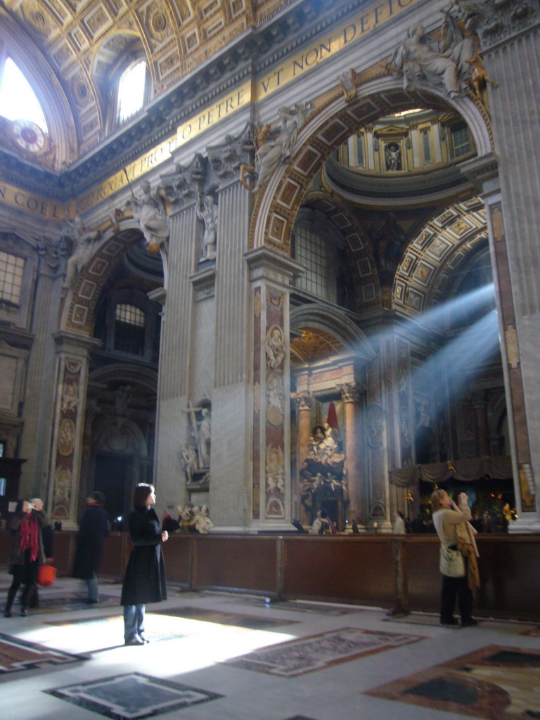 Miaomiao in the nave of St. Peter`s Basilica, with the statue of St. Peter of Alcantara and the Monument to Pope Benedict XV