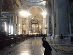 Miaomiao in the nave of St. Peter`s Basilica, with the Papal Altar, Baldacchino and the Tribune