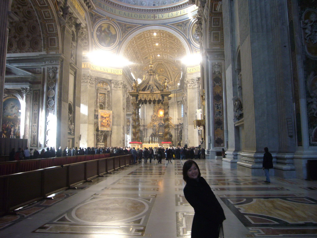 Miaomiao in the nave of St. Peter`s Basilica, with the Papal Altar, Baldacchino and the Tribune