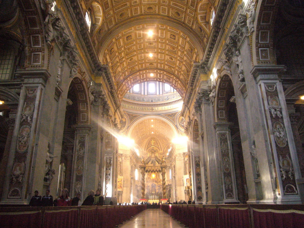 The nave of St. Peter`s Basilica, with the Papal Altar, Baldacchino and the Tribune