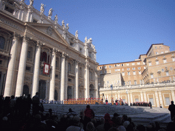 The facade of St. Peter`s Basilica, with the Pope`s Window, the Papal Swiss Guards and an orchestra, right before the Christmas celebrations