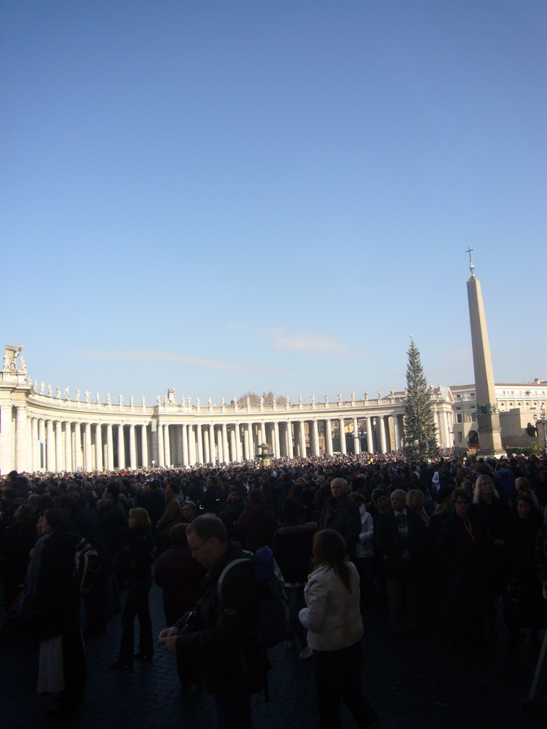 The north side of Saint Peter`s Square, with the Vatican Obelisk and a christmas tree, right before the Christmas celebrations