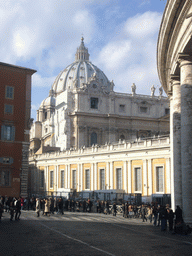 The Dome, clock and bell of St. Peter`s Basilica, and the south gallery