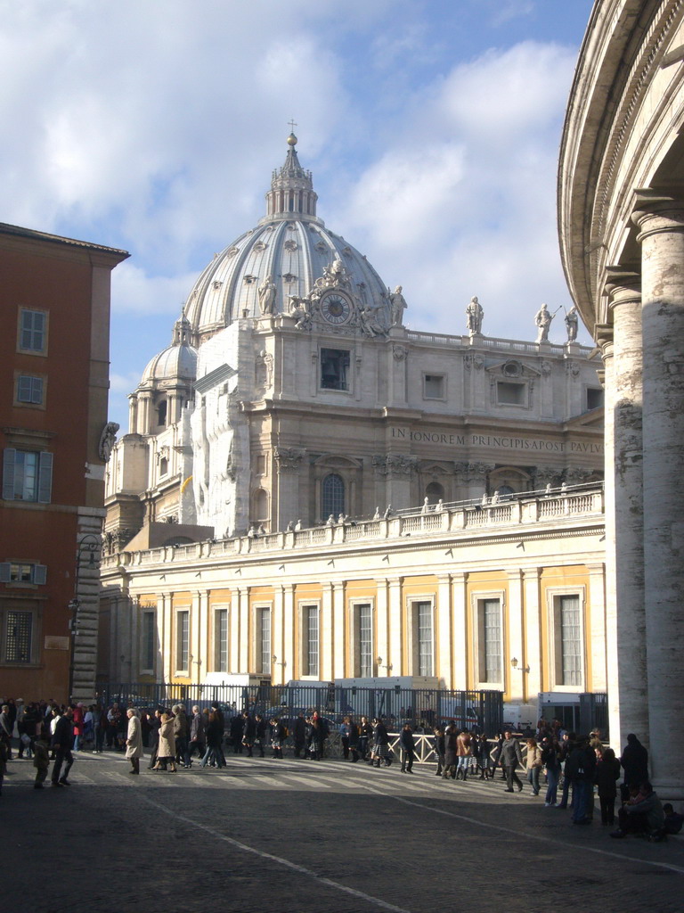 The Dome, clock and bell of St. Peter`s Basilica, and the south gallery