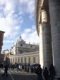 The Dome, clock and bell of St. Peter`s Basilica, and the south gallery