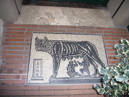 Floor mosaic in front of a shop