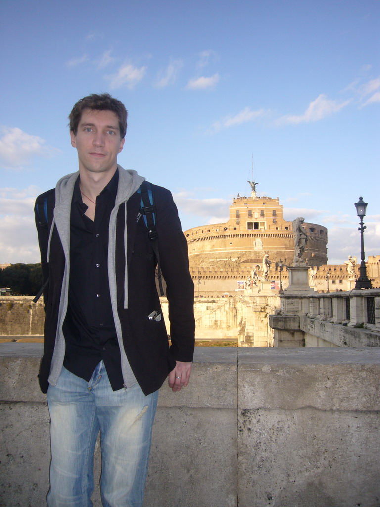 Tim at the Ponte Sant`Angelo bridge, the Tiber river and the Castel Sant`Angelo