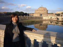 Miaomiao and the Ponte Sant`Angelo bridge, the Tiber river and the Castel Sant`Angelo