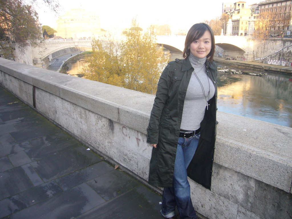 Miaomiao at the Ponte Vittorio Emanuele II bridge, the Tiber river and the Castel Sant`Angelo