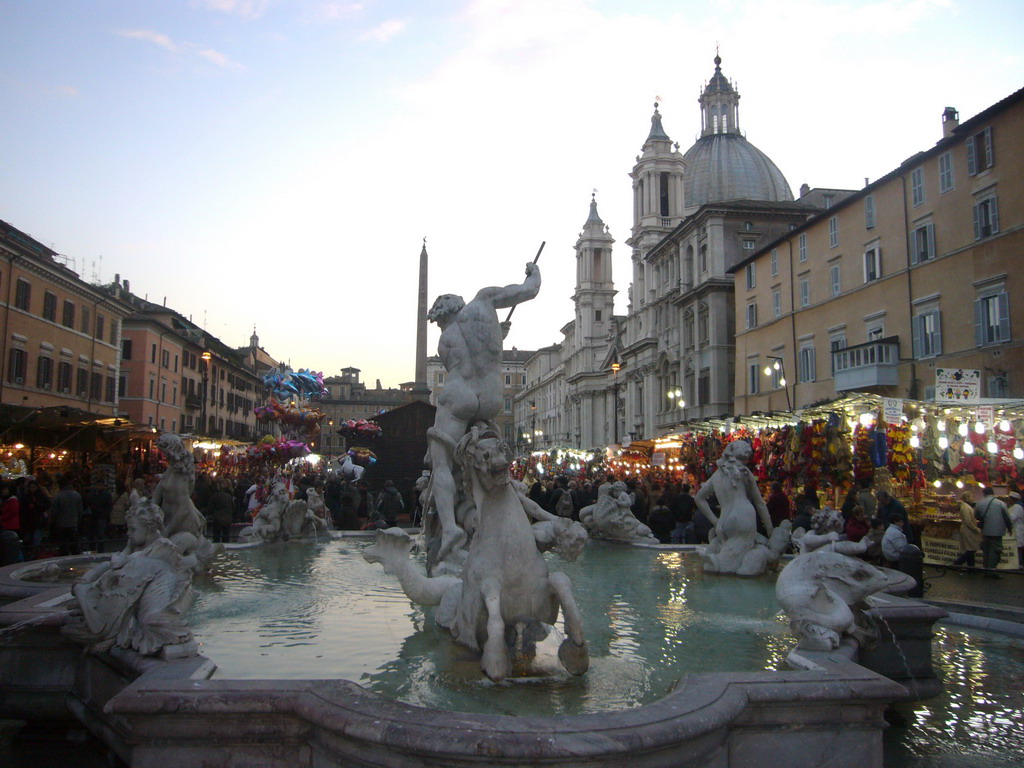The Fountain of Neptune, the Palazzo Pamphilj, the Egyptian Obelisk and the christmas market, at the Piazza Navona