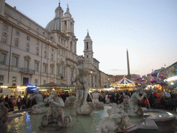 The More Fountain, the Palazzo Pamphilj, the Egyptian Obelisk and the christmas market, at the Piazza Navona