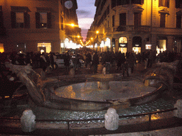 The Fontana della Barcaccia fountain at the Piazza di Spagna square, by night