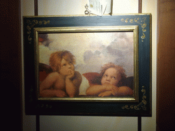 Painting with the two angels from the painting `Sistine Madonna` by Rafael, in a restaurant at the Piazza di Spagna