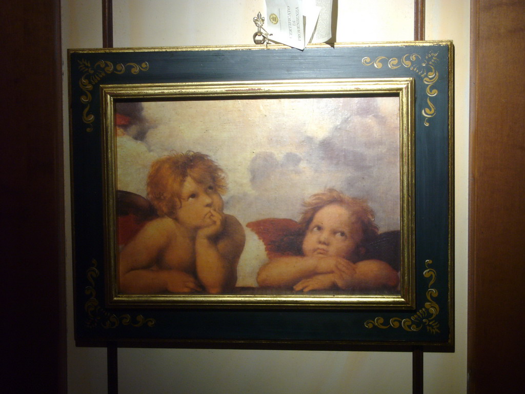 Painting with the two angels from the painting `Sistine Madonna` by Rafael, in a restaurant at the Piazza di Spagna