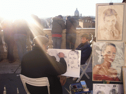 Street artists at the Piazza della Trinità dei Monti square