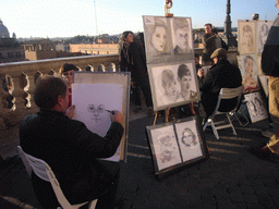 Street artists at the Piazza della Trinità dei Monti square