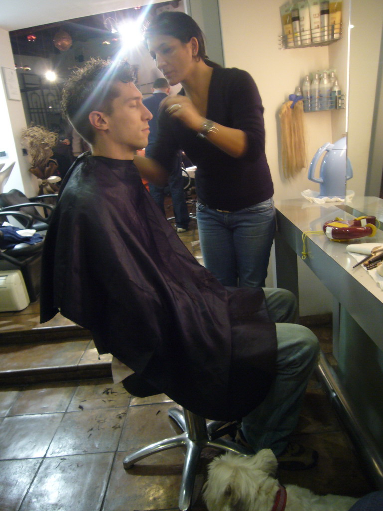 Tim at a barber shop in the city center