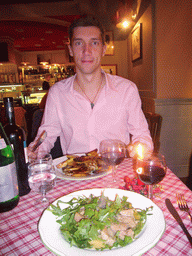 Tim having dinner in the restaurant `That`s Amore`