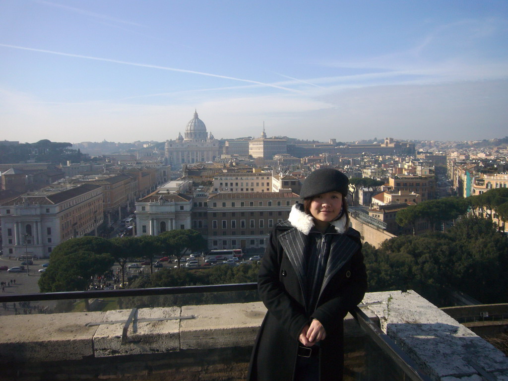 Miaomiao with a view from the Castel Sant`Angelo on the Via della Conciliazione street and St. Peter`s Basilica